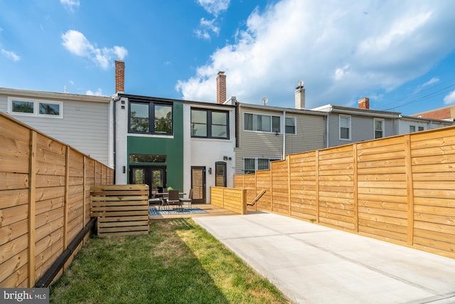 rear view of house with a patio area