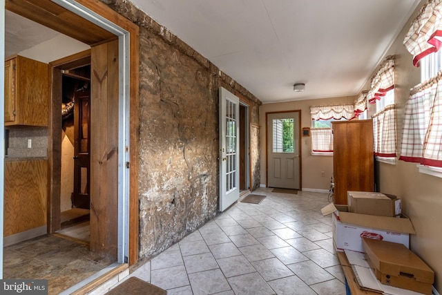 interior space featuring light tile patterned floors