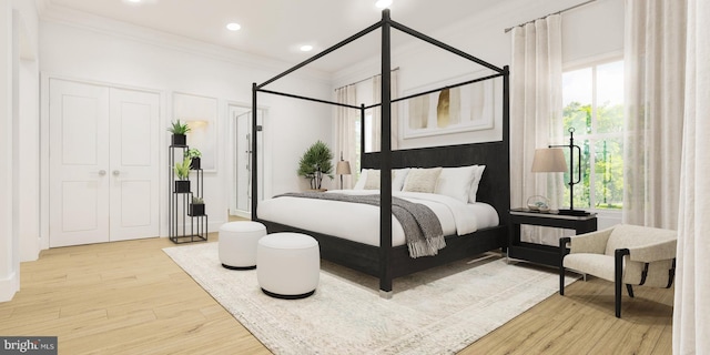 bedroom featuring light hardwood / wood-style floors, crown molding, and multiple windows