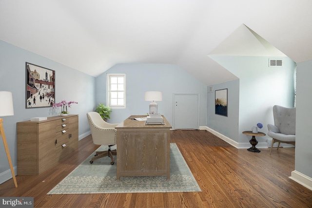 office area with dark hardwood / wood-style flooring and lofted ceiling