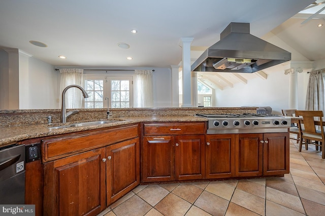 kitchen with stainless steel appliances, a wealth of natural light, sink, and extractor fan