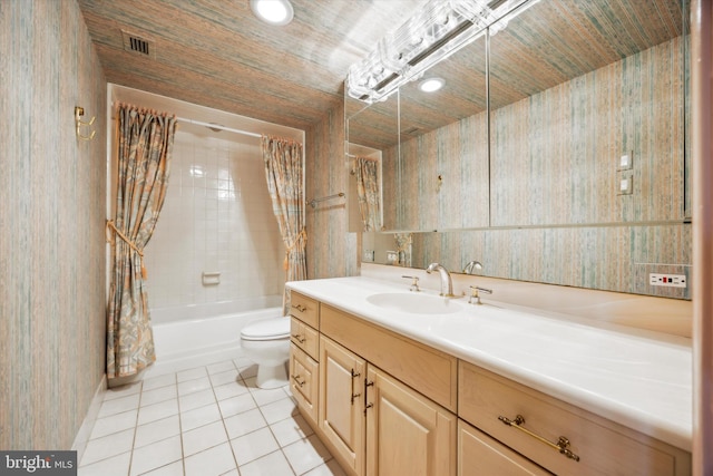 full bathroom featuring tile patterned flooring, shower / bath combo, toilet, and vanity