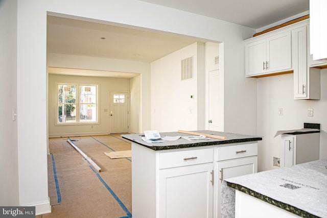 kitchen with white cabinetry