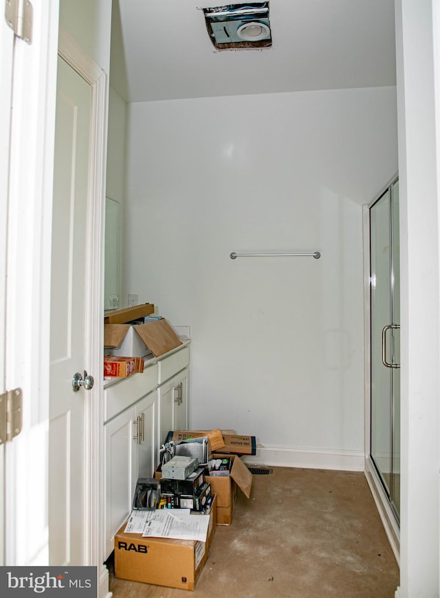 bathroom with concrete floors