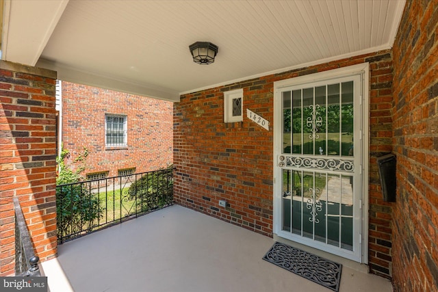 entrance to property with a porch