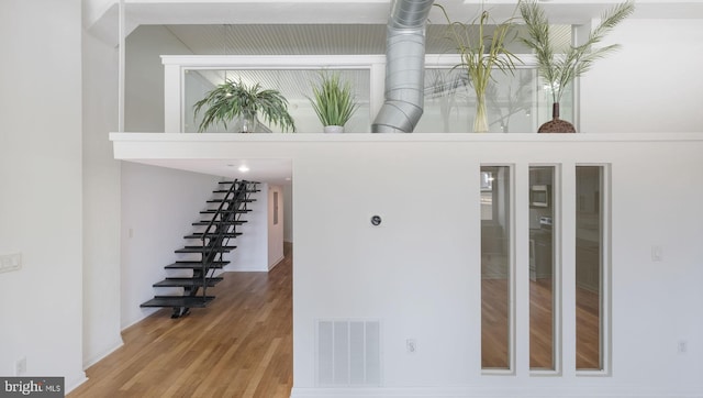 interior space with hardwood / wood-style flooring