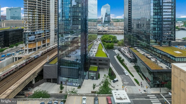 property's view of city featuring a water view