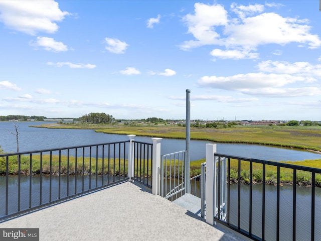 exterior space with a water view