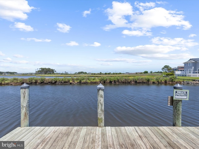 view of dock featuring a water view