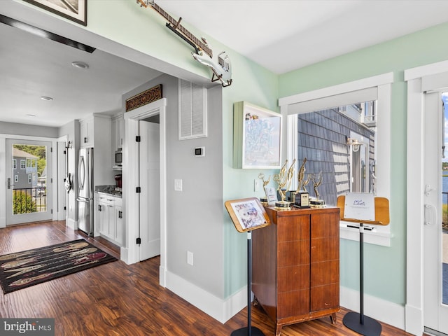 interior space featuring dark hardwood / wood-style flooring