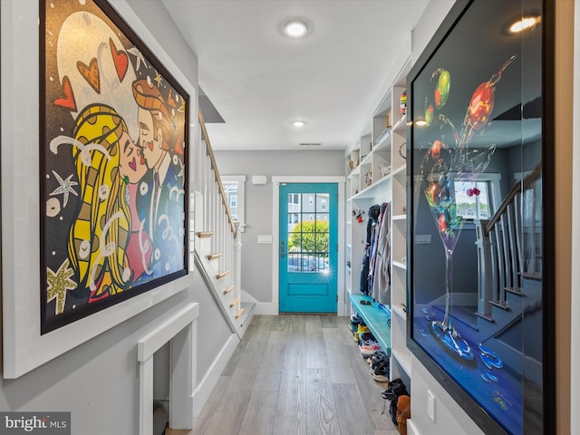 mudroom with light wood-type flooring