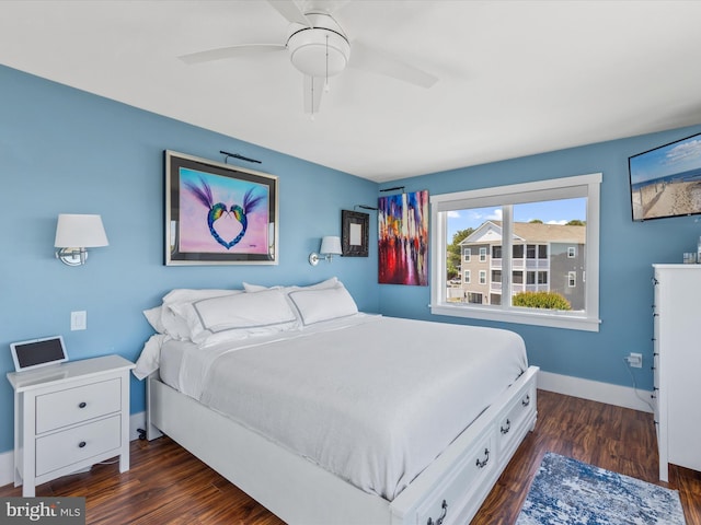 bedroom featuring ceiling fan and dark wood-type flooring