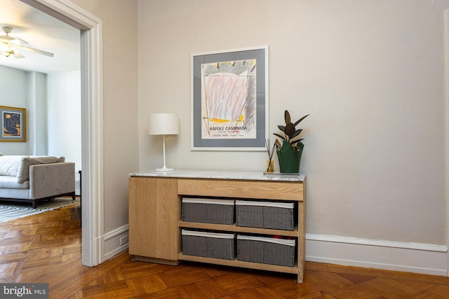 room details with ceiling fan and parquet floors