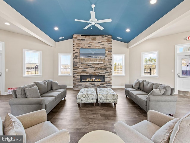 living room featuring a fireplace, ceiling fan, dark hardwood / wood-style flooring, and lofted ceiling