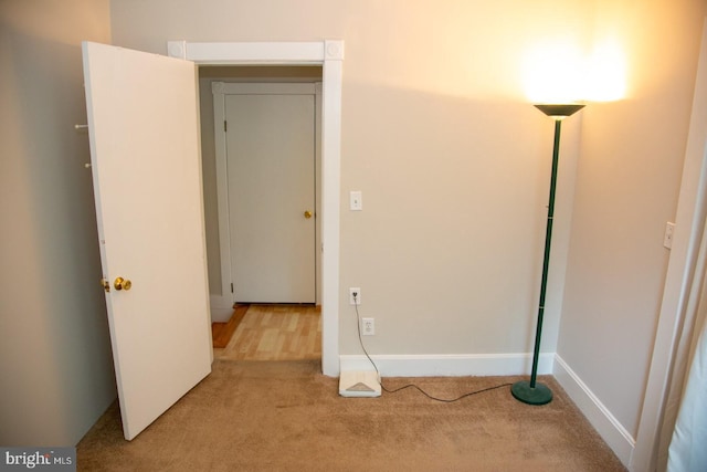 unfurnished bedroom with light colored carpet