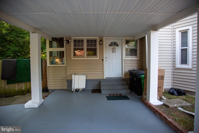 property entrance featuring covered porch