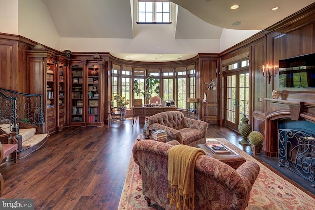 living room with french doors, high vaulted ceiling, and dark wood-type flooring