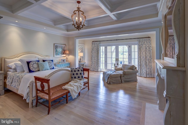 bedroom featuring coffered ceiling, beamed ceiling, ornamental molding, a notable chandelier, and light wood-type flooring