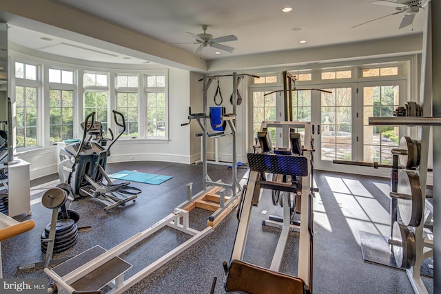 workout area with ceiling fan and french doors