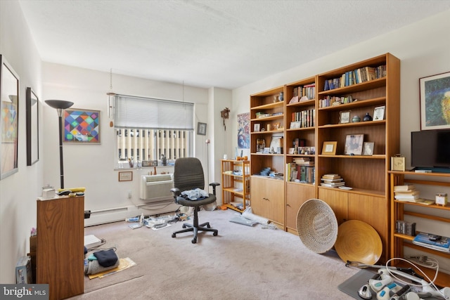 office with an AC wall unit, a textured ceiling, light colored carpet, and a baseboard radiator