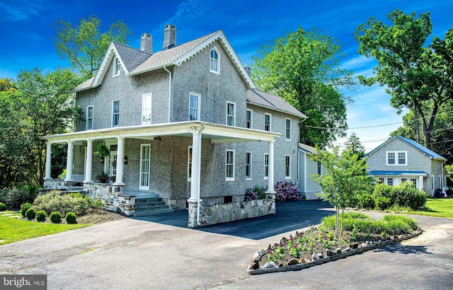 view of front of home featuring covered porch