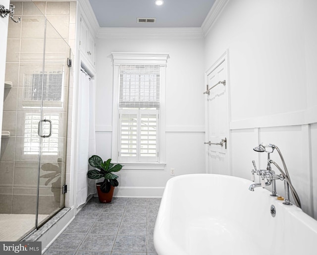 bathroom with tile patterned floors, ornamental molding, and independent shower and bath