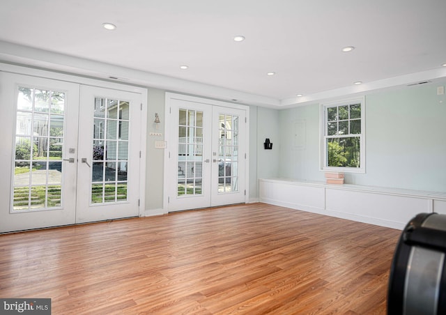 interior space featuring french doors and light hardwood / wood-style flooring