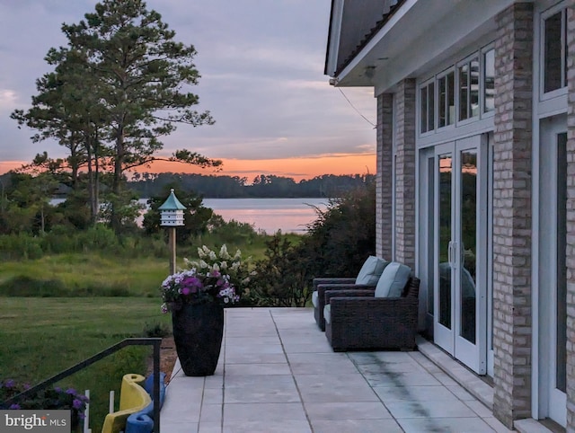 patio terrace at dusk with french doors