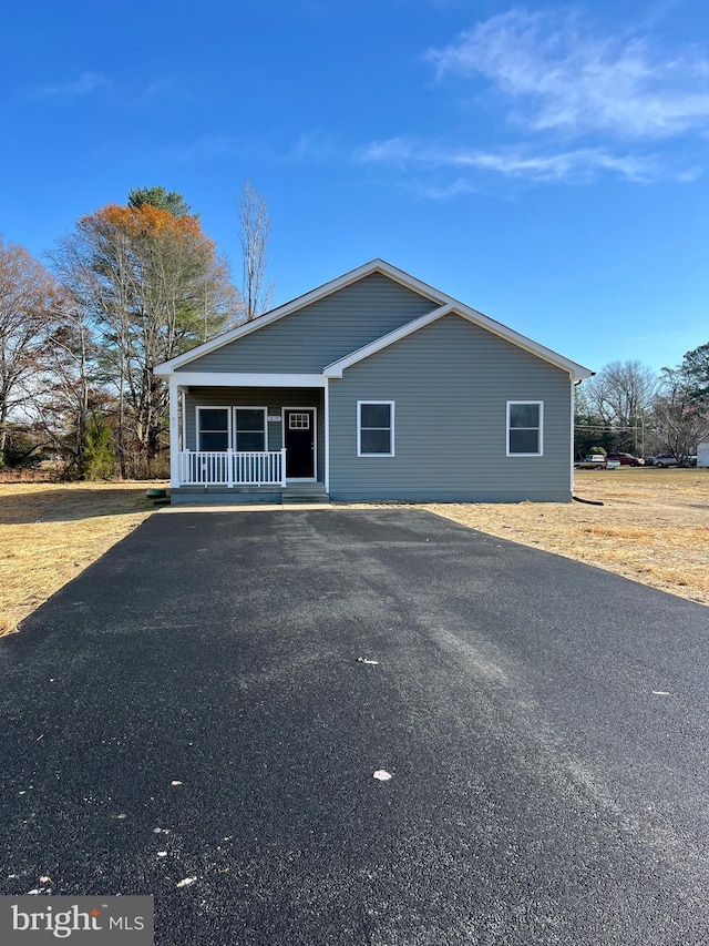 exterior space featuring covered porch