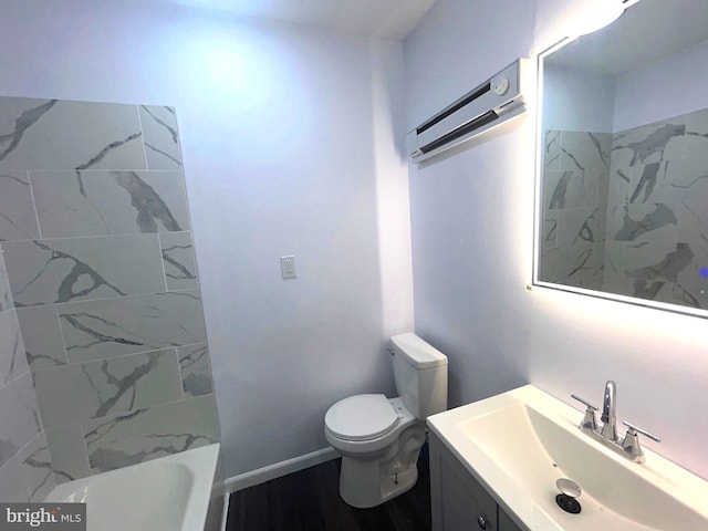 bathroom with vanity, toilet, wood-type flooring, and a wall unit AC