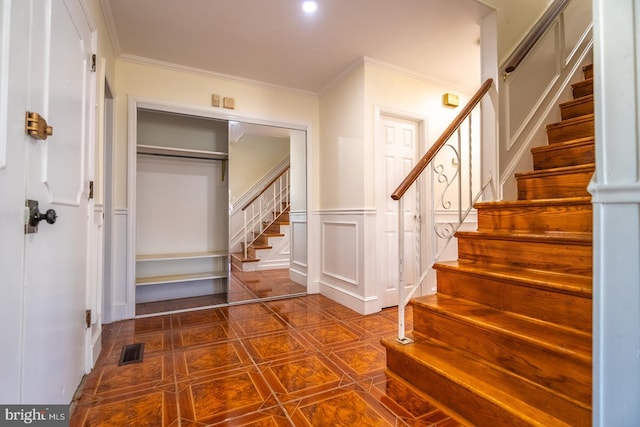 stairs featuring ornamental molding