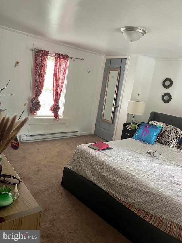 bedroom featuring carpet flooring and a baseboard radiator