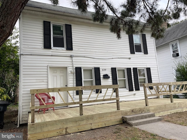 view of front of home with a deck