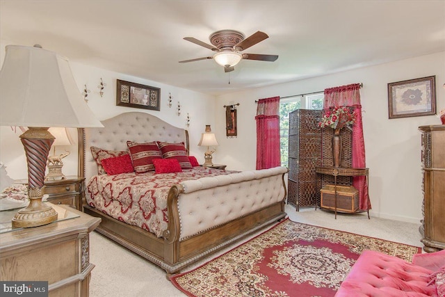 bedroom featuring ceiling fan and carpet floors