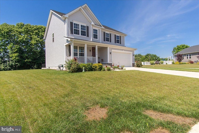 view of front of property featuring covered porch, a garage, and a front yard