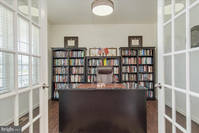 home office with french doors and dark hardwood / wood-style floors