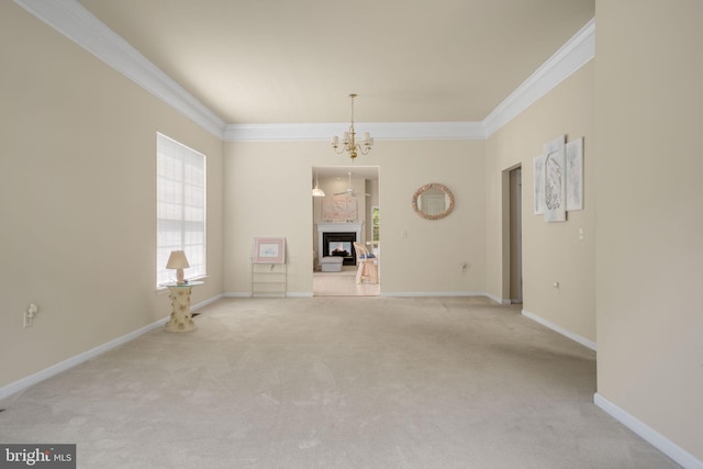 interior space featuring ornamental molding, light carpet, a multi sided fireplace, a chandelier, and baseboards