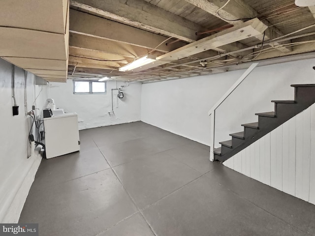 basement featuring washer / clothes dryer and stairs