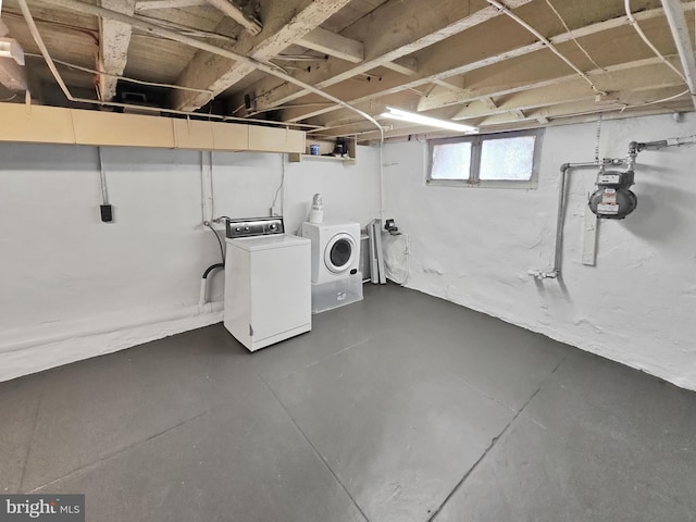 basement with separate washer and dryer