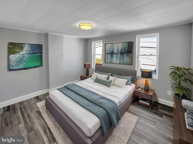 bedroom featuring hardwood / wood-style flooring