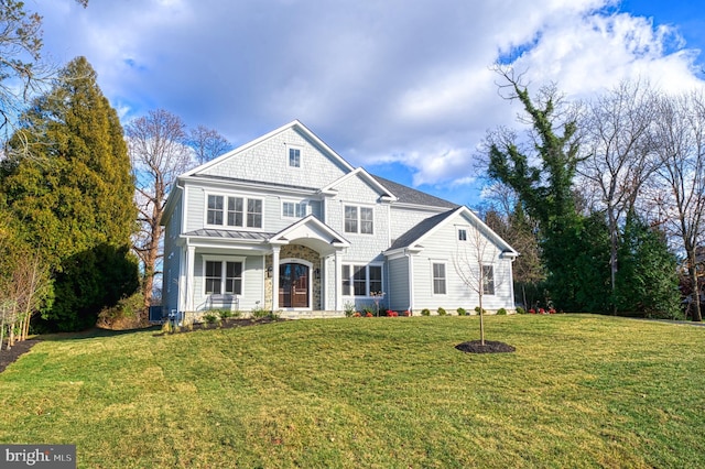 view of front facade featuring a front yard