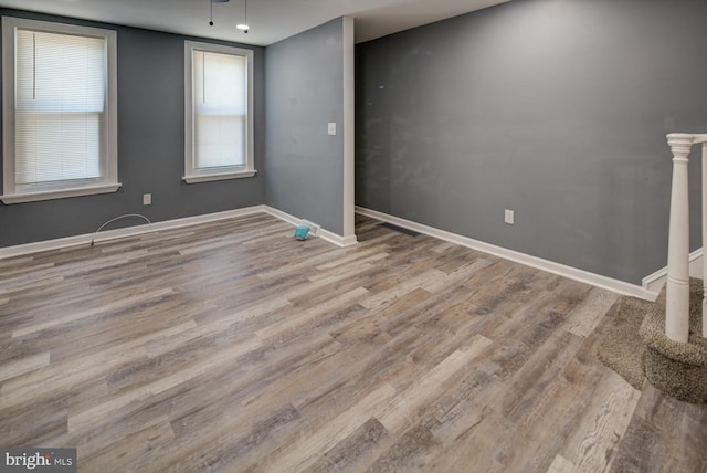 unfurnished room featuring light hardwood / wood-style flooring