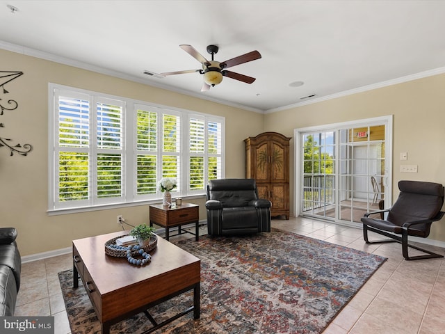 tiled living room featuring ceiling fan and ornamental molding