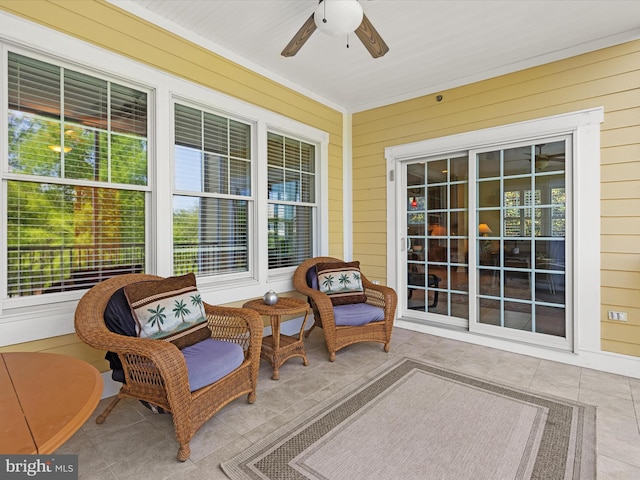 view of patio featuring ceiling fan