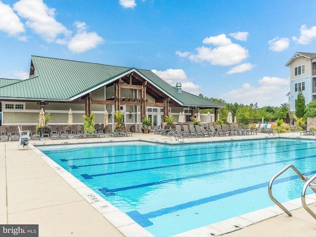 view of pool with a patio area