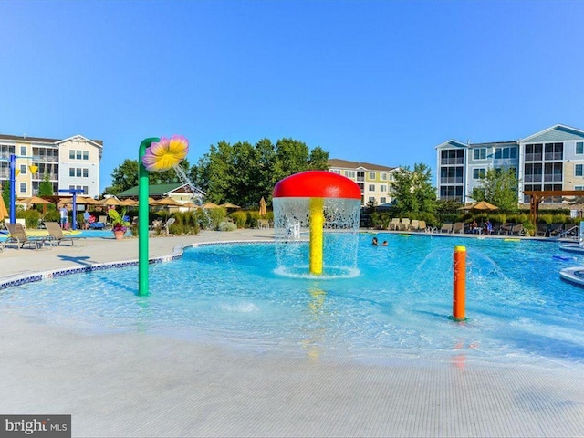 view of pool featuring pool water feature