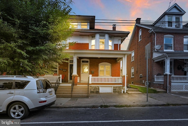 view of front of property with covered porch