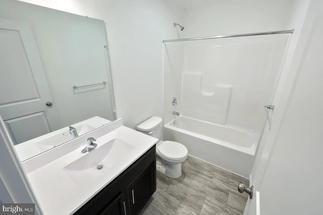 full bathroom with toilet, shower / bath combination, and vanity