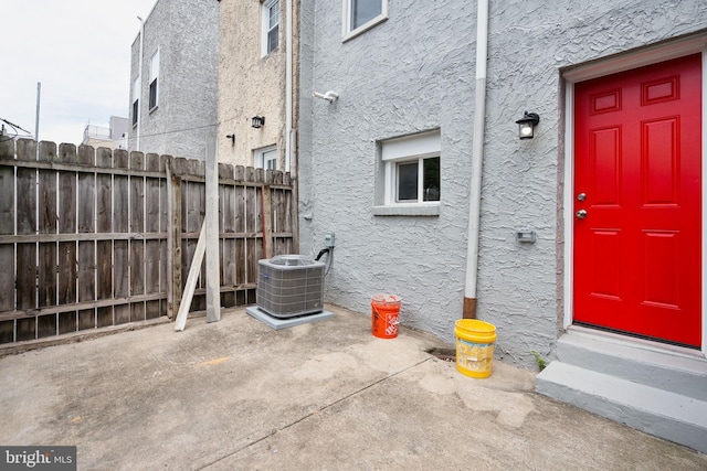 property entrance featuring central AC