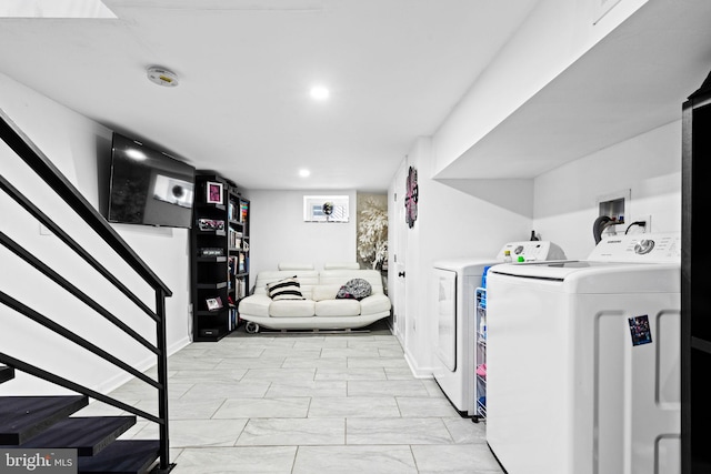 washroom featuring washer and clothes dryer